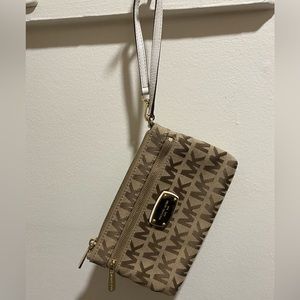 Michael Kors wrist purse. Tan/Brown with gold zipper.